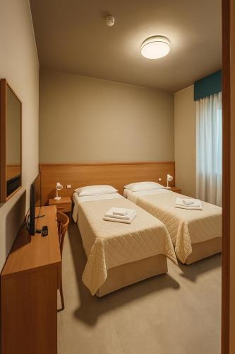 Hotel Realにあるベッド