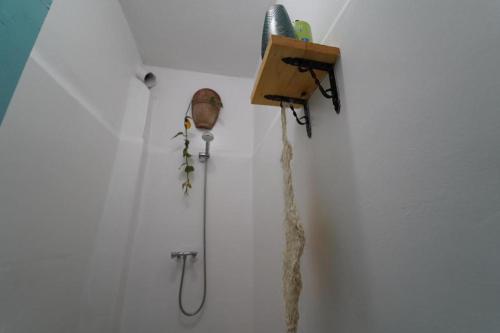 a room with a wall with a hook up to a wall at Anza sets house in Agadir
