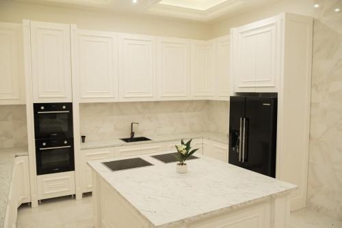 Una cocina o zona de cocina en Villa White
