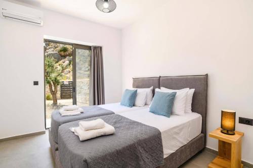 En eller flere senge i et værelse på Villa Zen Zazan by Villa Plus