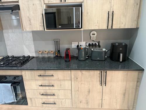 Gambar di galeri bagi Luxury Apartment Hotel Style di Roodepoort