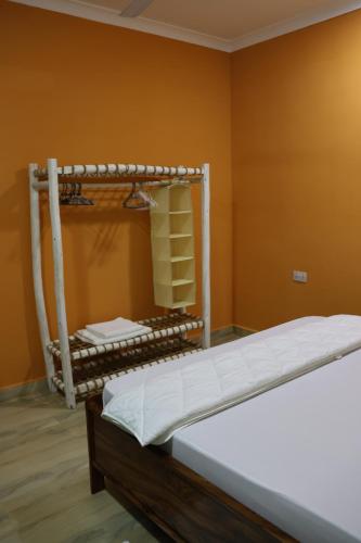a bedroom with a bunk bed in a room at DADA GARDEN NUNGWI Private villas in Nungwi