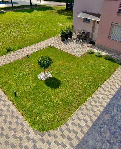 Zahrada ubytování Apartman Cresnar