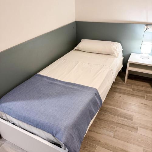 Postel nebo postele na pokoji v ubytování Hotel Montenuovo 44