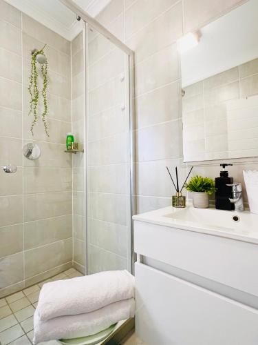 a bathroom with a shower and a sink at Lagoon - The Blyde in Pretoria