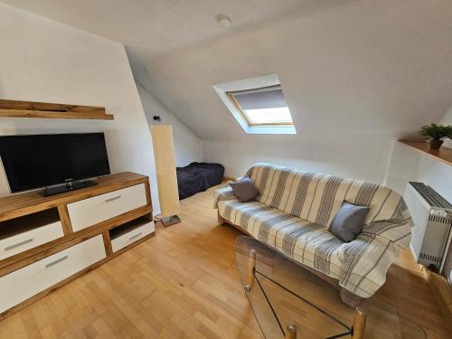 TV a/nebo společenská místnost v ubytování Ela's Kleine Auszeit - im Herzen der Wetterau