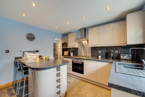 Kuchyň nebo kuchyňský kout v ubytování Clematis Cottage