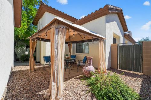 a gazebo in the backyard of a house at Elm Casita Apts in Litchfield Park
