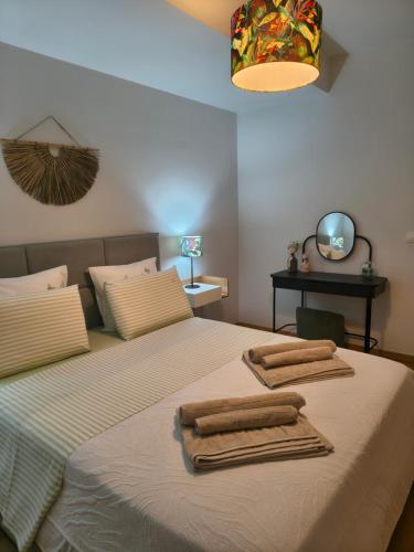 Ένα ή περισσότερα κρεβάτια σε δωμάτιο στο The elegant urban apartment