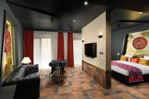 Кровать или кровати в номере Minaro Hotel Tokaj - MGallery Collection