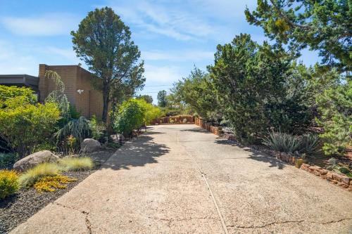 a garden path with trees and plants at Pony Soldier Sedona Escape in Sedona
