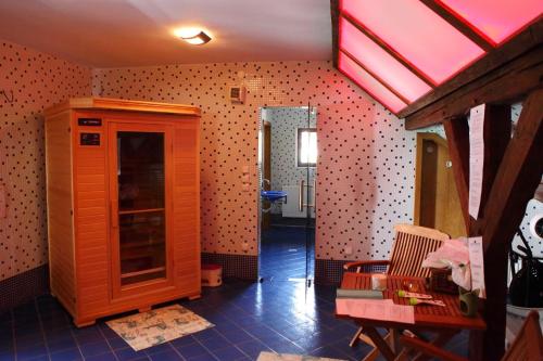 a living room with a room with a wall at Pension U Martina in Rožmberk nad Vltavou