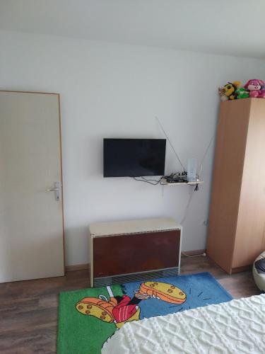 Télévision ou salle de divertissement dans l'établissement Stefke 2