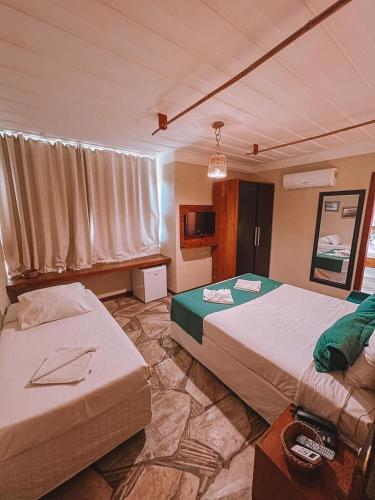 Katil atau katil-katil dalam bilik di PIER BEACH CLUB