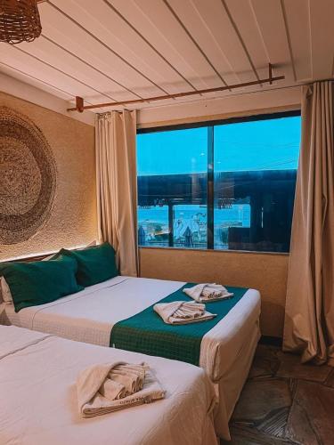 Katil atau katil-katil dalam bilik di PIER BEACH CLUB