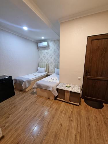 Hotel Lotus Akhaltsikheにあるベッド