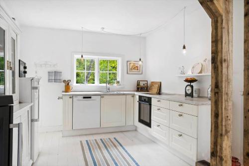 Una cocina o zona de cocina en M364-Vaeggerlose-Botovej-46