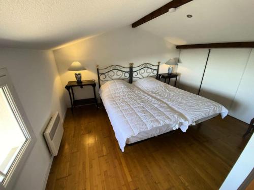 Ένα ή περισσότερα κρεβάτια σε δωμάτιο στο Résidence Le Moana - 002 - Maison avec vue exceptionnelle sur l'Océan MAE-2391