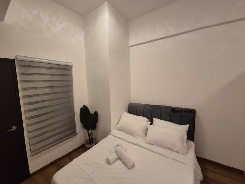 Ένα ή περισσότερα κρεβάτια σε δωμάτιο στο Cozy Living Space Edusentral