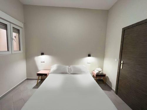 Katil atau katil-katil dalam bilik di Hostal Pompeya Merida