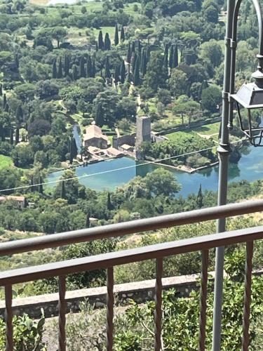 a view of a river from a balcony at Ninfa in Norma