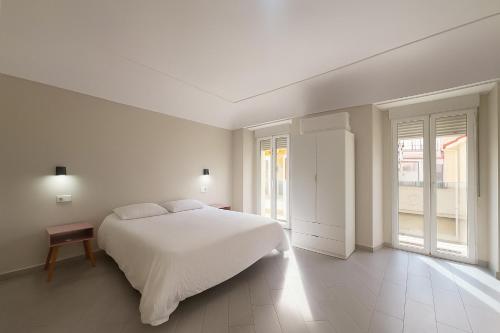 Katil atau katil-katil dalam bilik di Hostal Pompeya Merida