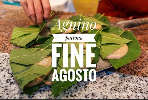 a sign that saysanna fine acoso on a pile of leaves at Rovaio in Fivizzano