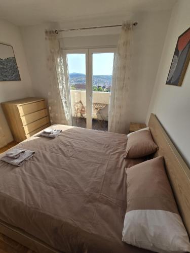 Cama o camas de una habitación en Apartman Emi