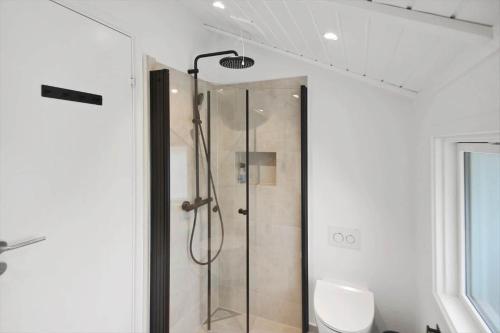 a shower in a bathroom with a glass shower stall at SL310-Slagelse-Birkevej-49 in Slagelse