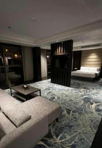 Ένα ή περισσότερα κρεβάτια σε δωμάτιο στο demashotel