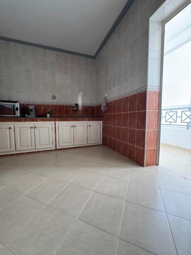 Una cocina o cocineta en Appartement spacieux Idéal famille proche de toutes commodité