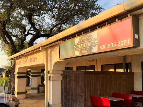 a building with a sign that reads kings hops at Breathtaking Views Hilltop for Couples Firepit in Canyon Lake