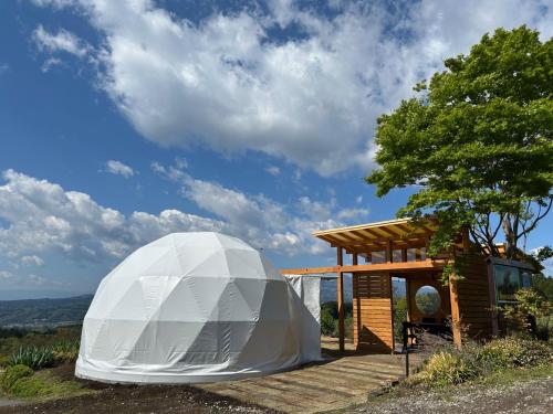 a large white dome sitting next to a building at Base Camp Spring - Vacation STAY 35489v in Shibukawa