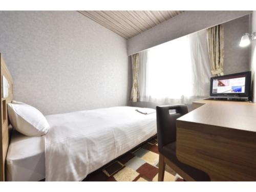 Postel nebo postele na pokoji v ubytování Smile Hotel Kushiro - Vacation STAY 10567v