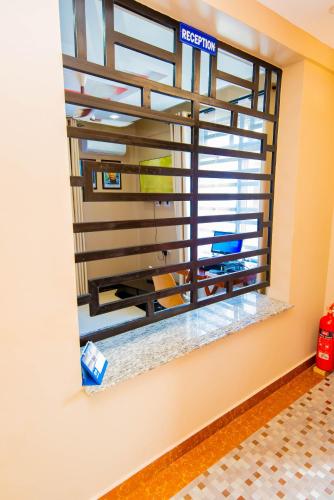 Postel nebo postele na pokoji v ubytování HBE HOTEL Kigamboni