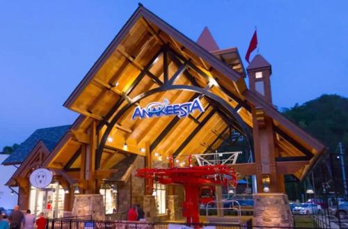 a building with an amex sign on it at Best Value Cabin Hot Tub Arcade Close to Strip in Pigeon Forge