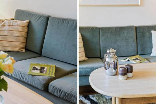 a living room with a couch and a table at TV1360-Bindslev-Munkebakken-5 in Bindslev