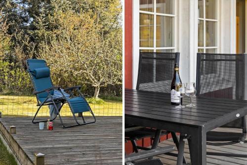 a picnic table and a chair and a bottle of wine at TV1360-Bindslev-Munkebakken-5 in Bindslev