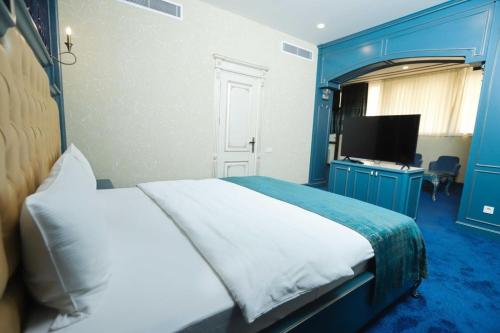 Katil atau katil-katil dalam bilik di Nerimanov Krone Hotel