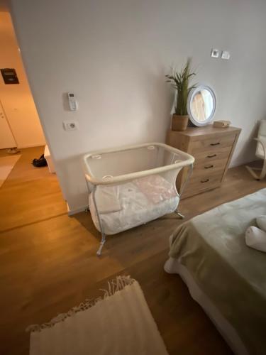 Un ou plusieurs lits dans un hébergement de l'établissement warm&stylish apartment