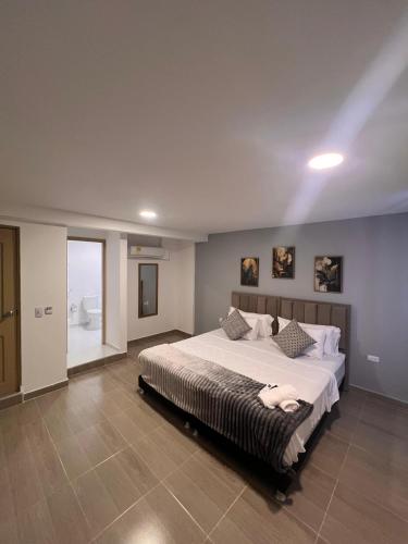 Una cama o camas en una habitación de Davé Paradise