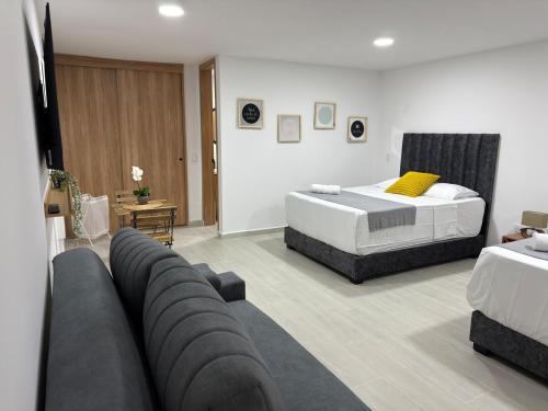 Postel nebo postele na pokoji v ubytování Nuevo apartamento en plaza principal de Guatape