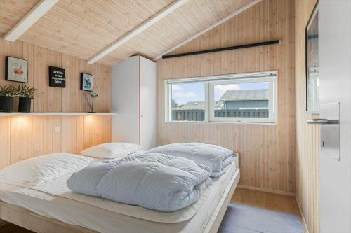 Ένα ή περισσότερα κρεβάτια σε δωμάτιο στο TV1009-Bindslev-Paradisdalen-9