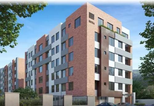 a rendering of a tall brick building at Air Stay in Ambato