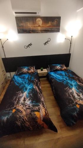 Postel nebo postele na pokoji v ubytování IN Apartments
