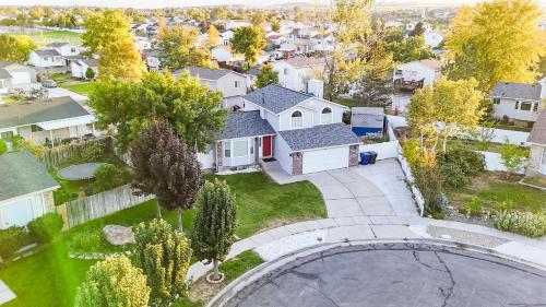an aerial view of a house with a driveway at Newly Renovated 5 BR 3 Bth in SLC in Salt Lake City