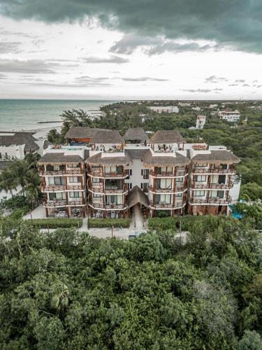an aerial view of a resort on the beach at Casa Astral Hotel Boutique and Apartments in Holbox Island