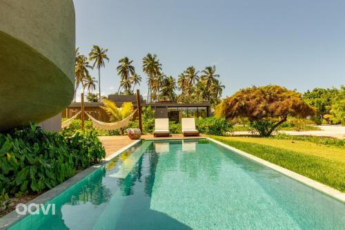 Bazén v ubytování Casa com Piscina na Praia de Tatuamunha by Qavi nebo v jeho okolí