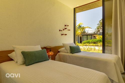 Postel nebo postele na pokoji v ubytování Casa com Piscina na Praia de Tatuamunha by Qavi