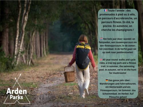 a woman with a backpack and a basket walking down a dirt road at Glamping in Signy-l Abbaye in Signy-lʼAbbaye